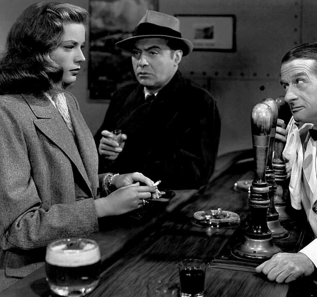 Image of Lauren Bacall and Charles Boyer in Confidential Agent