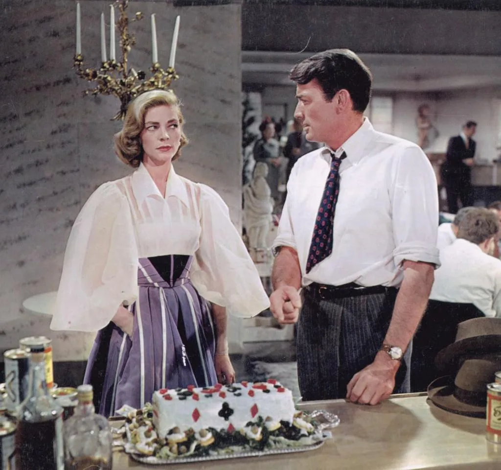 Image of Lauren Bacall and Gregory Peck in Designing Woman