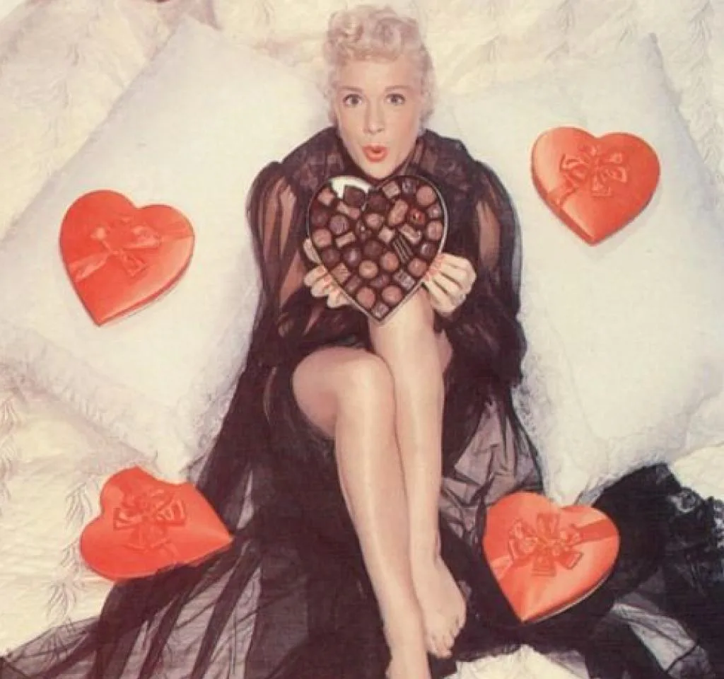 Image of Betty Hutton dressed as a 1950s valentines pinup