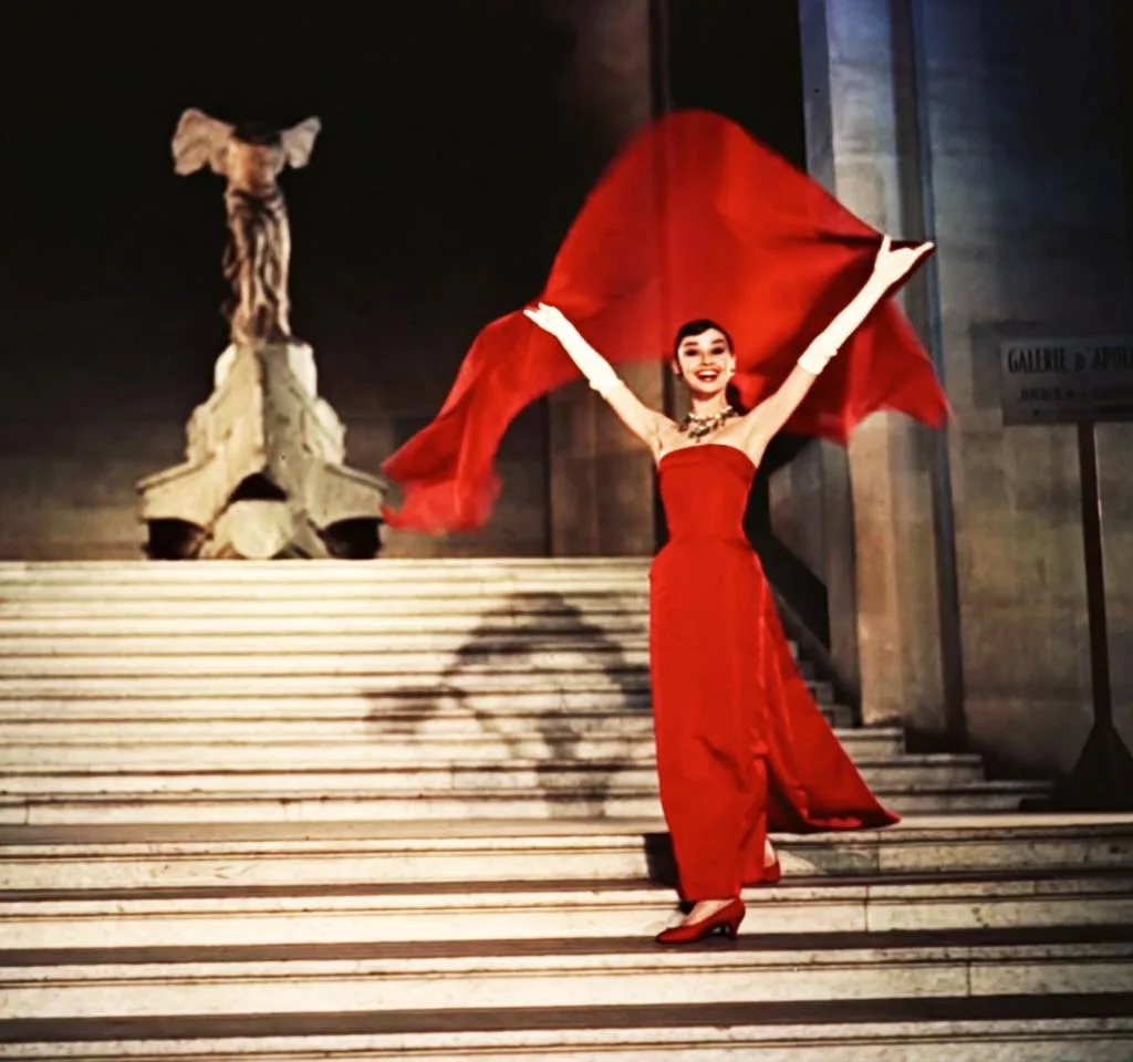 Image of Audrey Hepburn wearing a red dress in Funny Face